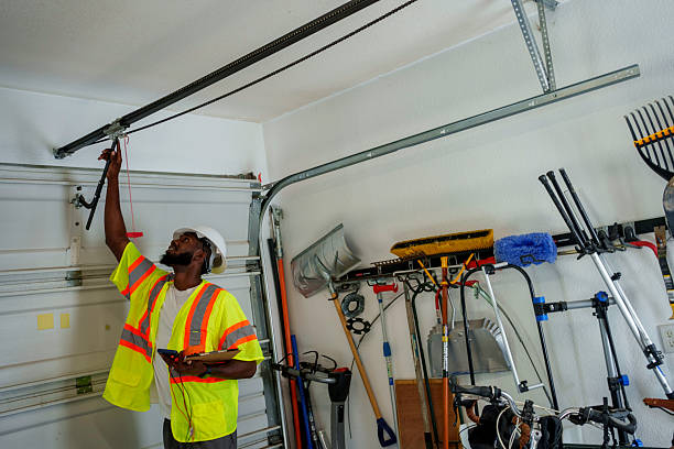 Professional Garage Door technician working in Harwood Heights, IL